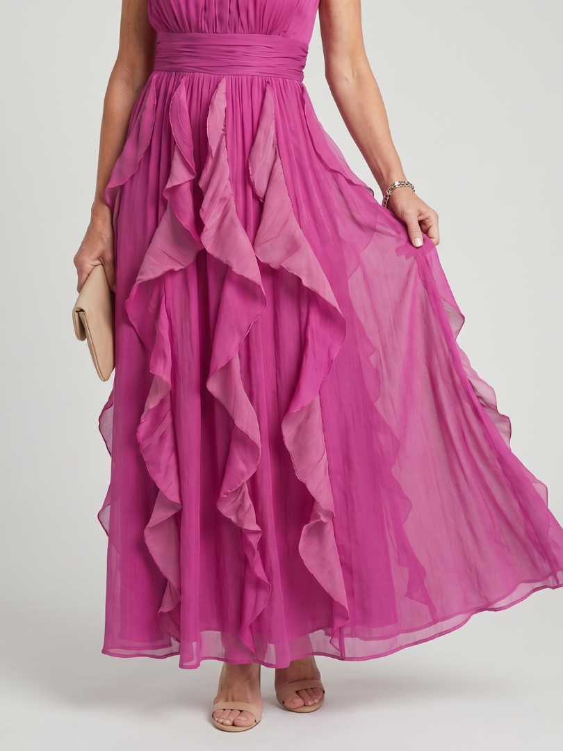Ana Gabriela Vestido largo en magenta con olanes