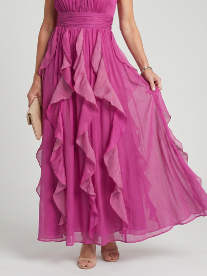 Ana Gabriela Vestido largo en magenta con olanes