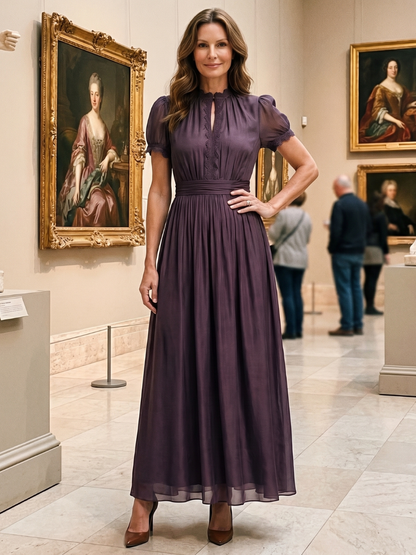 María Elena Vestido largo en ciruela con manga abullonada