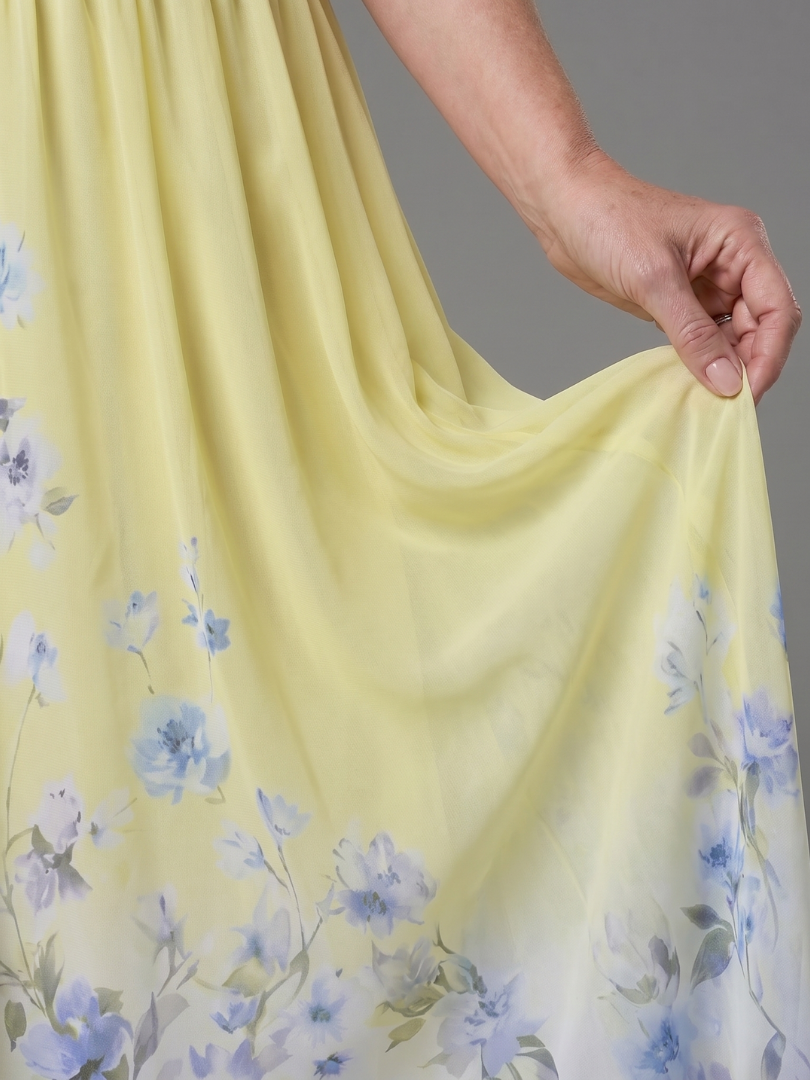 Ana Paula Vestido largo con flores en el ruedo en azul marino