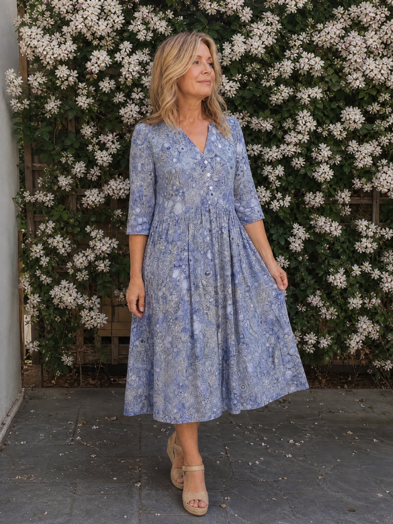 Lorena Vestido midi con flores pequeñas en beige