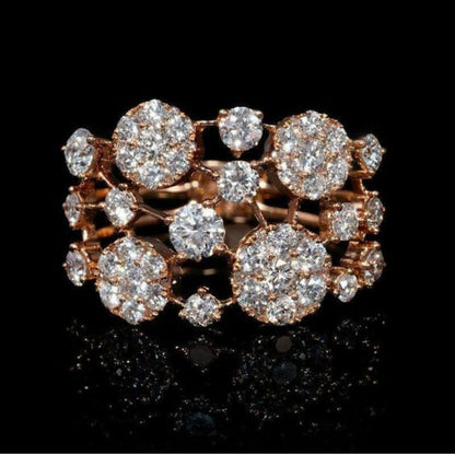 Anillo antiguo de oro rosa con piedras brillantes