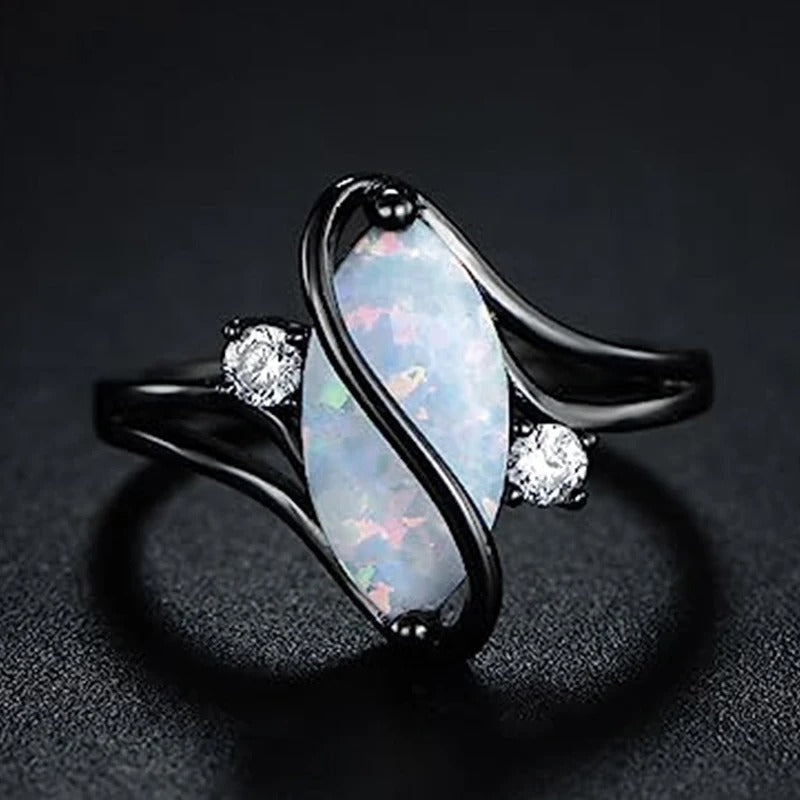 Anillo retro con ópalo negro retorcido