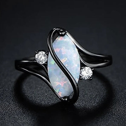 Anillo retro con ópalo negro retorcido