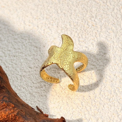 Anillo retro dorado ajustable "Estrella de mar"