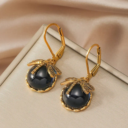 Aretes circulares de plata antigua