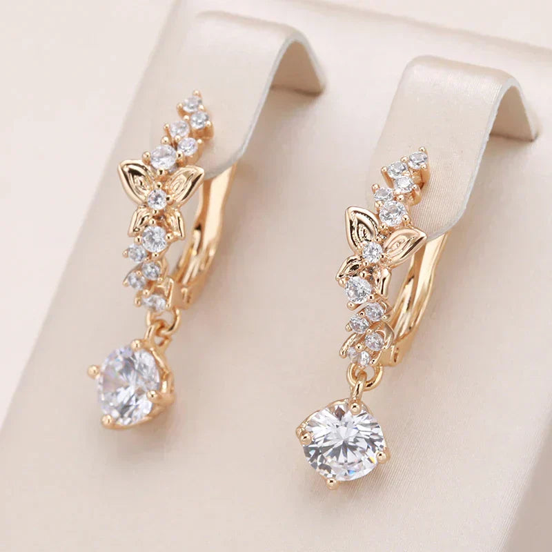 Aretes colgantes de oro con zirconia