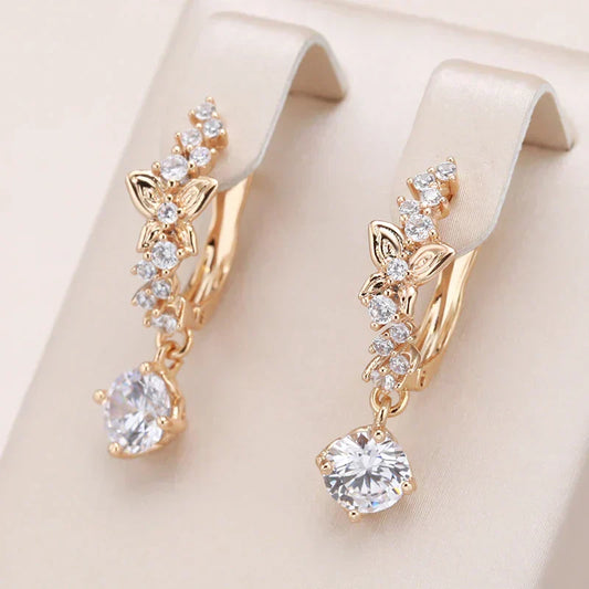 Aretes colgantes de oro con zirconia