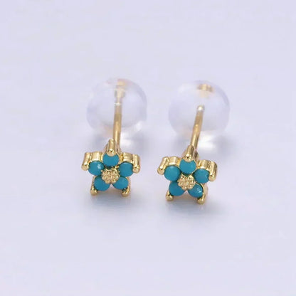 Aretes con diseño floral delicado