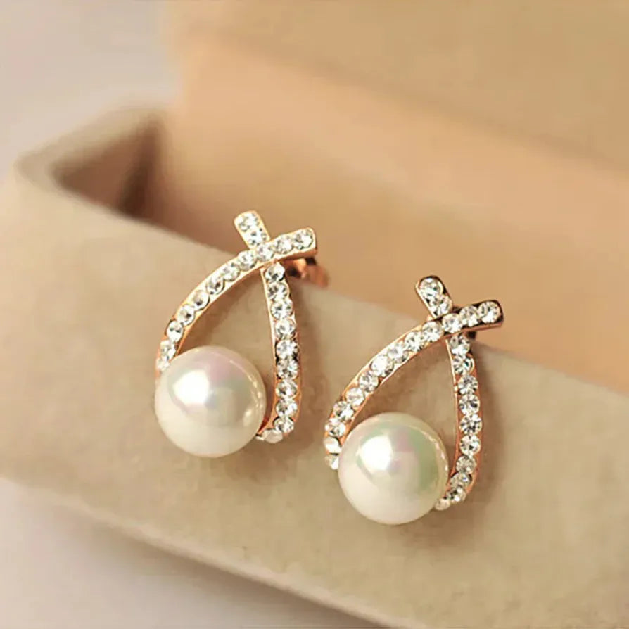 Aretes con perlas y cristales trenzados