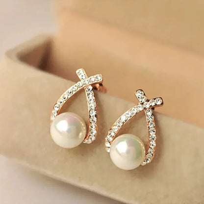 Aretes con perlas y cristales trenzados