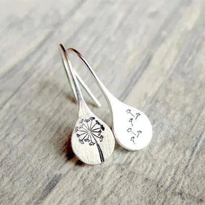 Aretes de encaje plateados