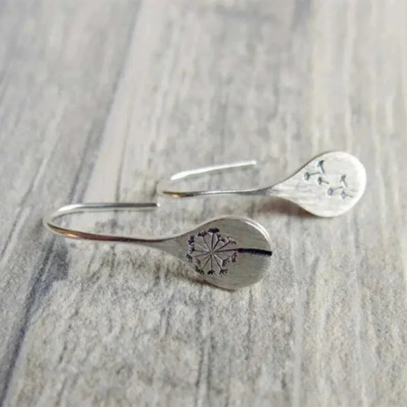 Aretes de encaje plateados