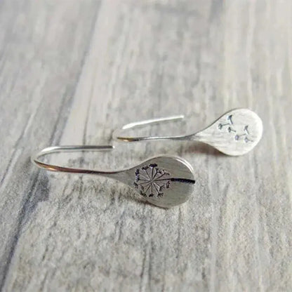 Aretes de encaje plateados