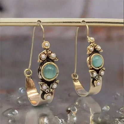 Aretes de estilo etno-retro con colgante