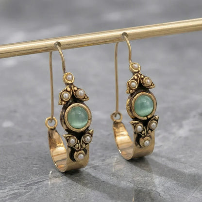 Aretes de estilo etno-retro con colgante