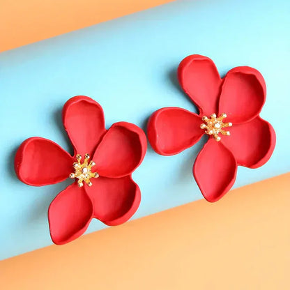 Aretes de flores doradas