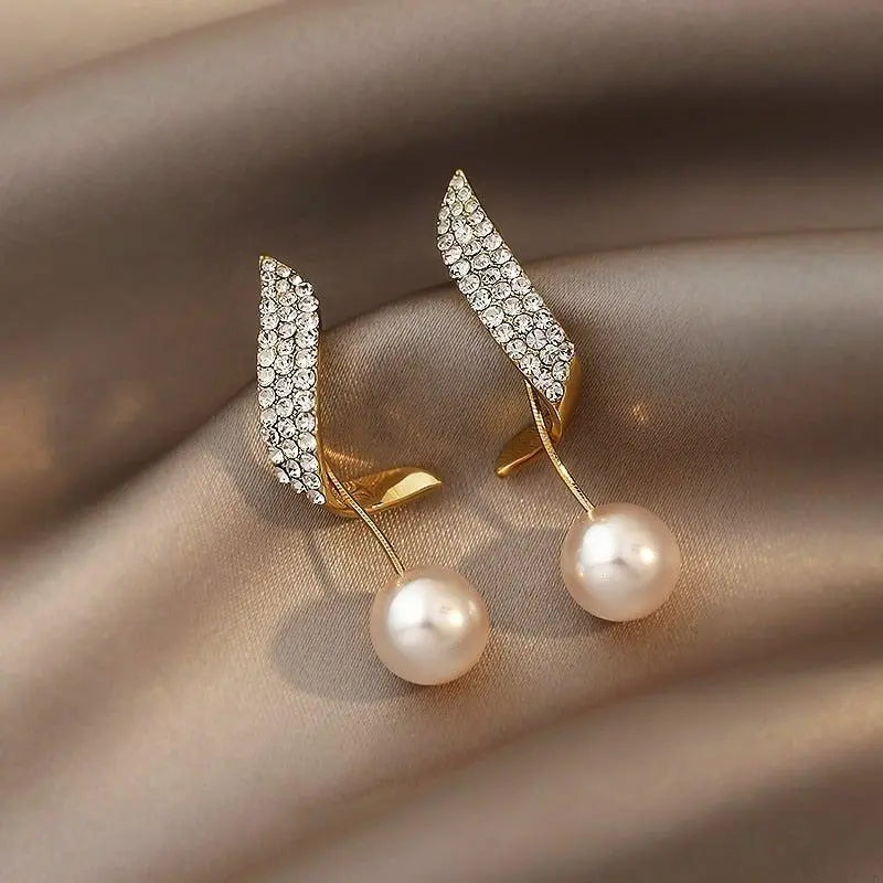 Aretes de oro con perlas