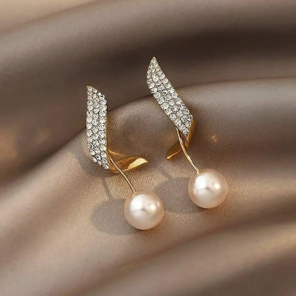Aretes de oro con perlas