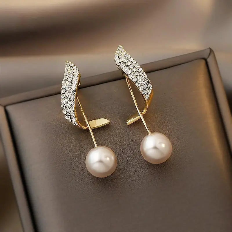 Aretes de oro con perlas