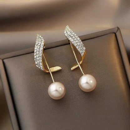 Aretes de oro con perlas