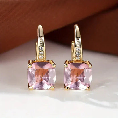 Aretes de oro con piedras misteriosas