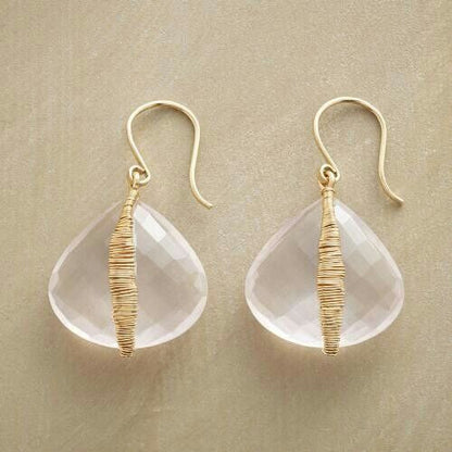 Aretes de oro hechos a mano con cristal blanco