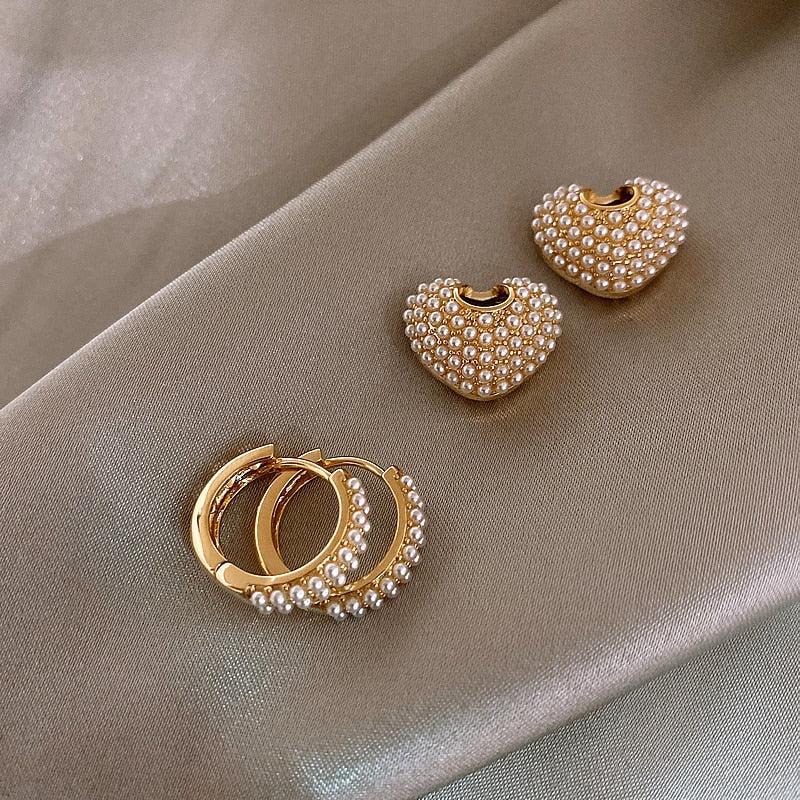 Aretes de perlas de amor en oro