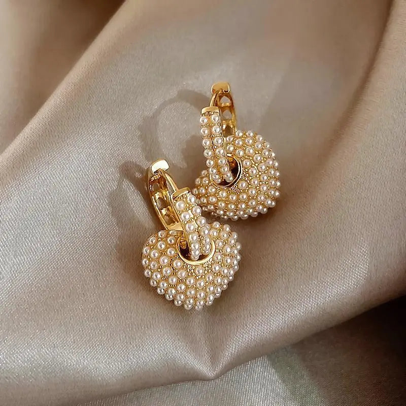 Aretes de perlas de amor en oro