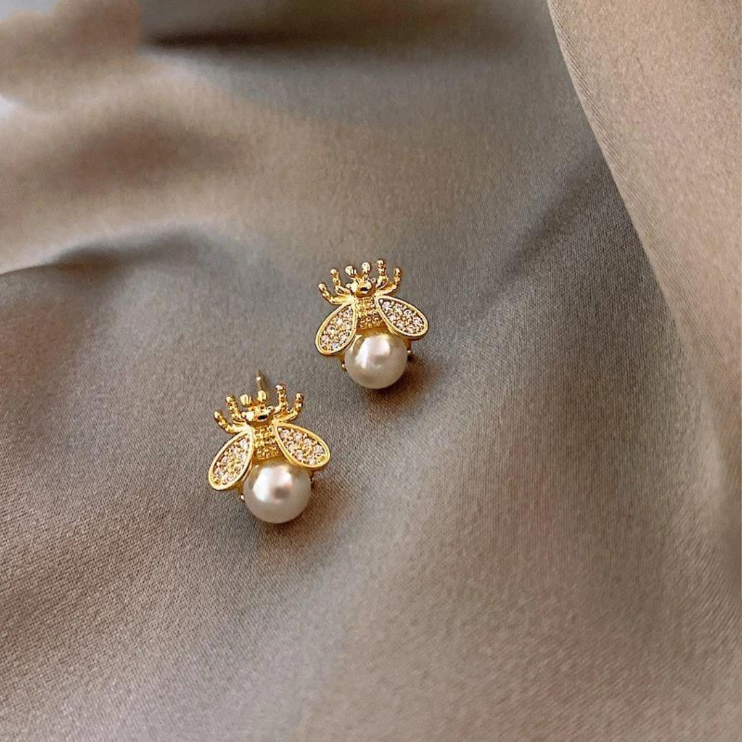 Aretes de perlas y zirconias doradas