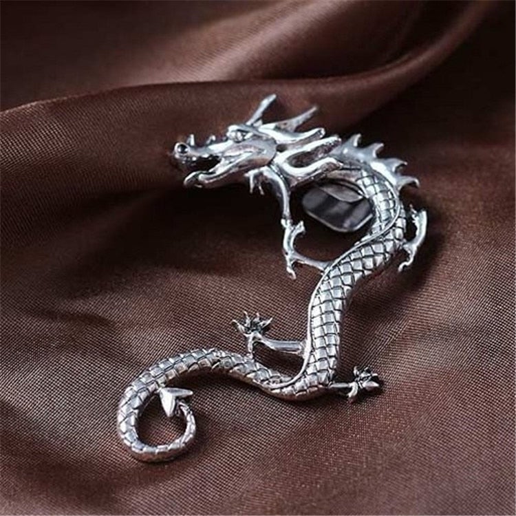 Aretes de plata en forma de dragón