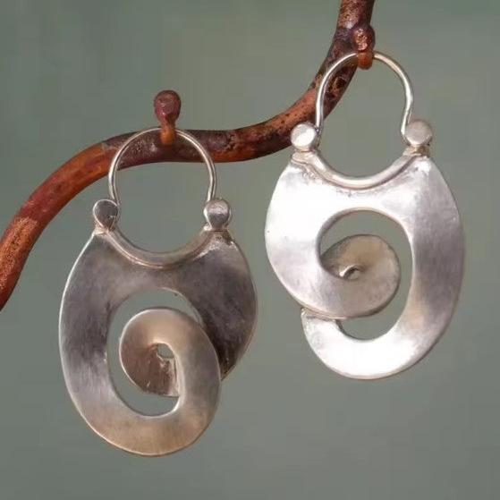 Aretes de plata vintage con espiral