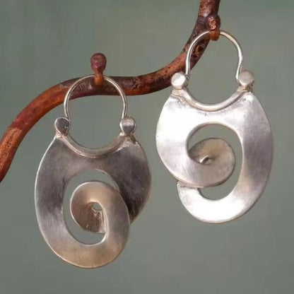 Aretes de plata vintage con espiral