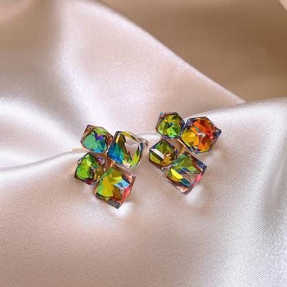 Aretes de zirconia colorida en elegante oro