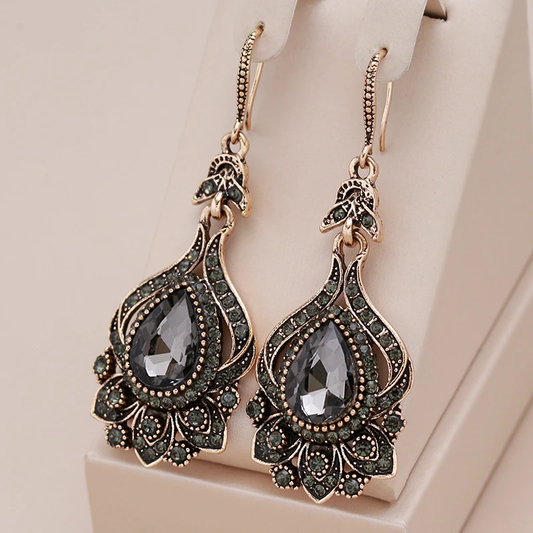Aretes elegantes de cristal negro Mandala