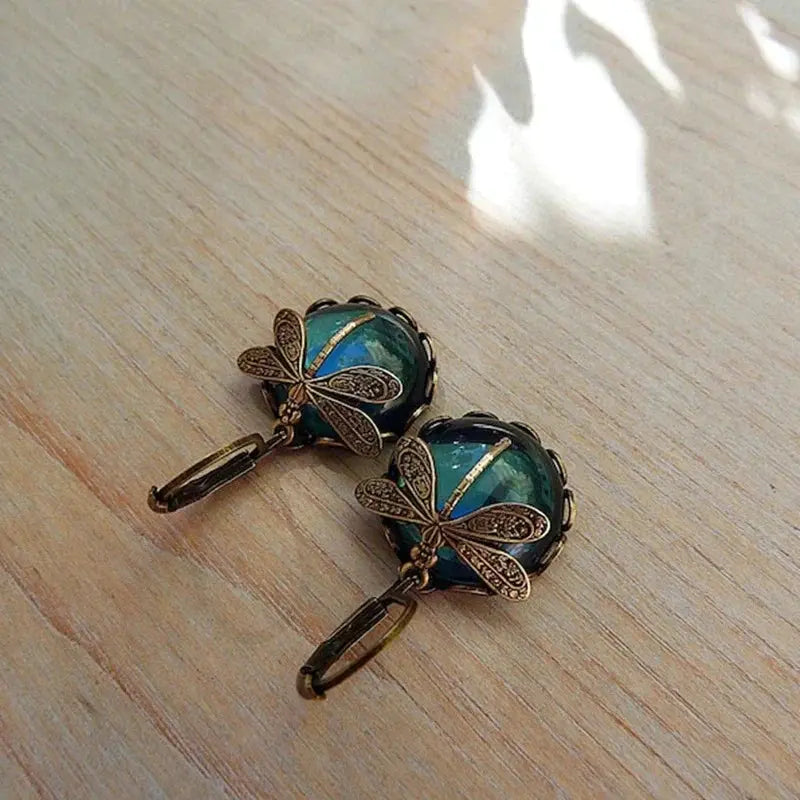Aretes en forma de esfera en oro envejecido