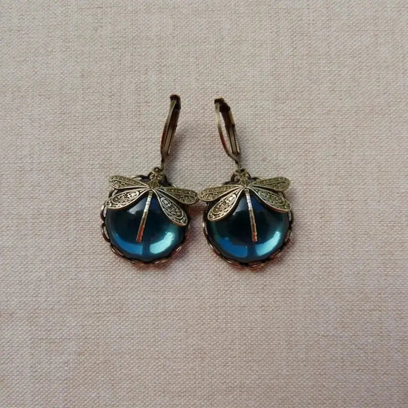 Aretes en forma de esfera en oro envejecido