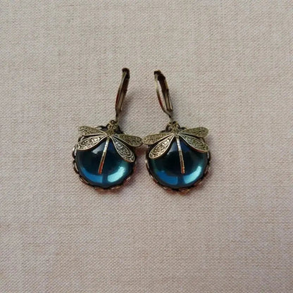 Aretes en forma de esfera en oro envejecido