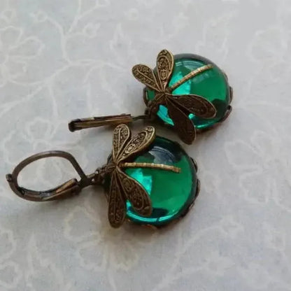Aretes en forma de esfera en oro envejecido