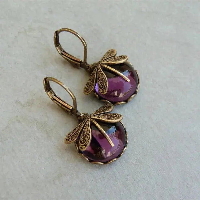 Aretes en forma de esfera en oro envejecido