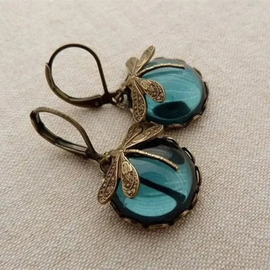 Aretes en forma de esfera en oro envejecido