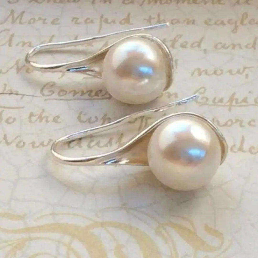 Aretes en forma de gota con margaritas