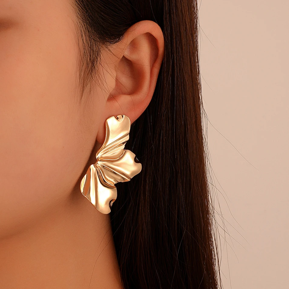 Aretes exóticos de oro