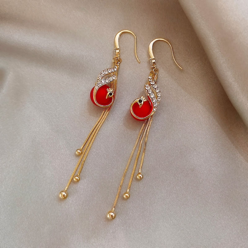 Aretes festivos con margaritas azules
