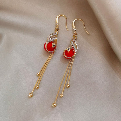 Aretes festivos con margaritas azules