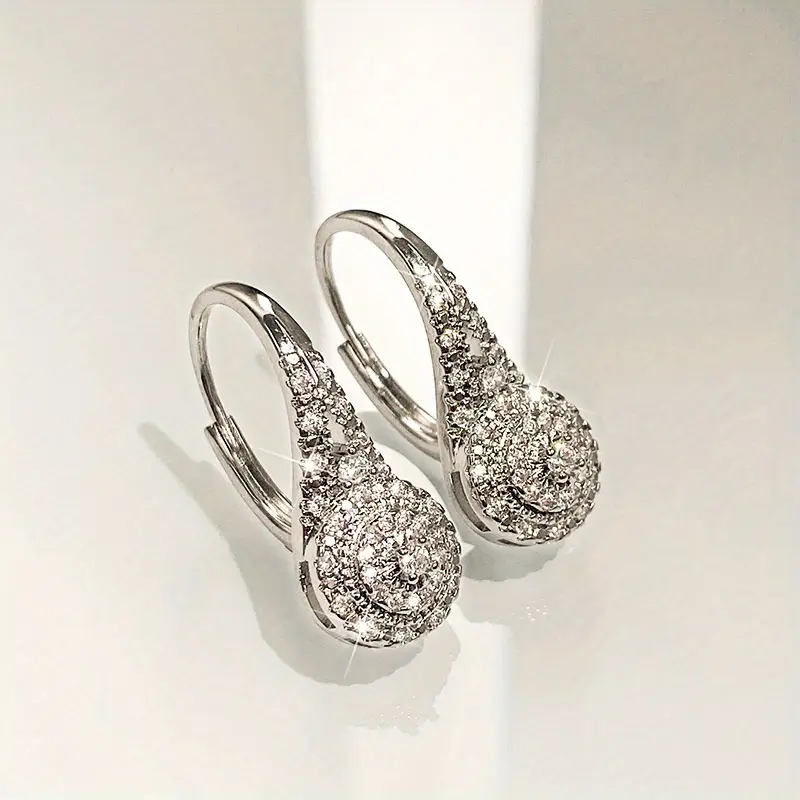Aretes redondos con gota brillante
