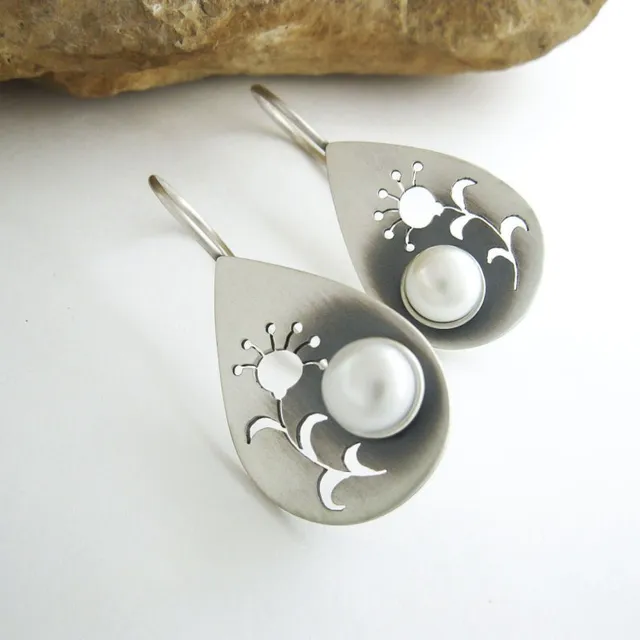 Aretes retro con flor y margarita