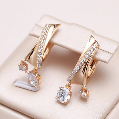 Aretes únicos de oro con zirconia