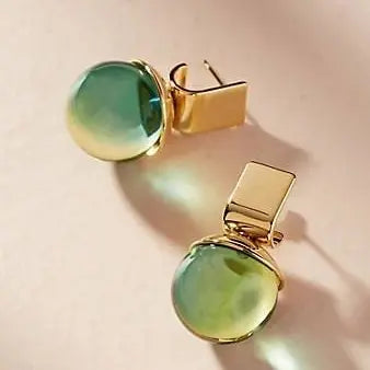 Aretes vintage con cristal verde en oro