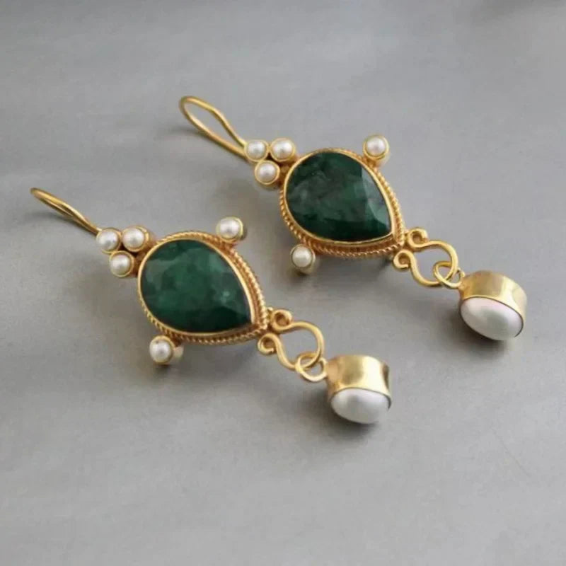 Aretes vintage con rubíes y margaritas